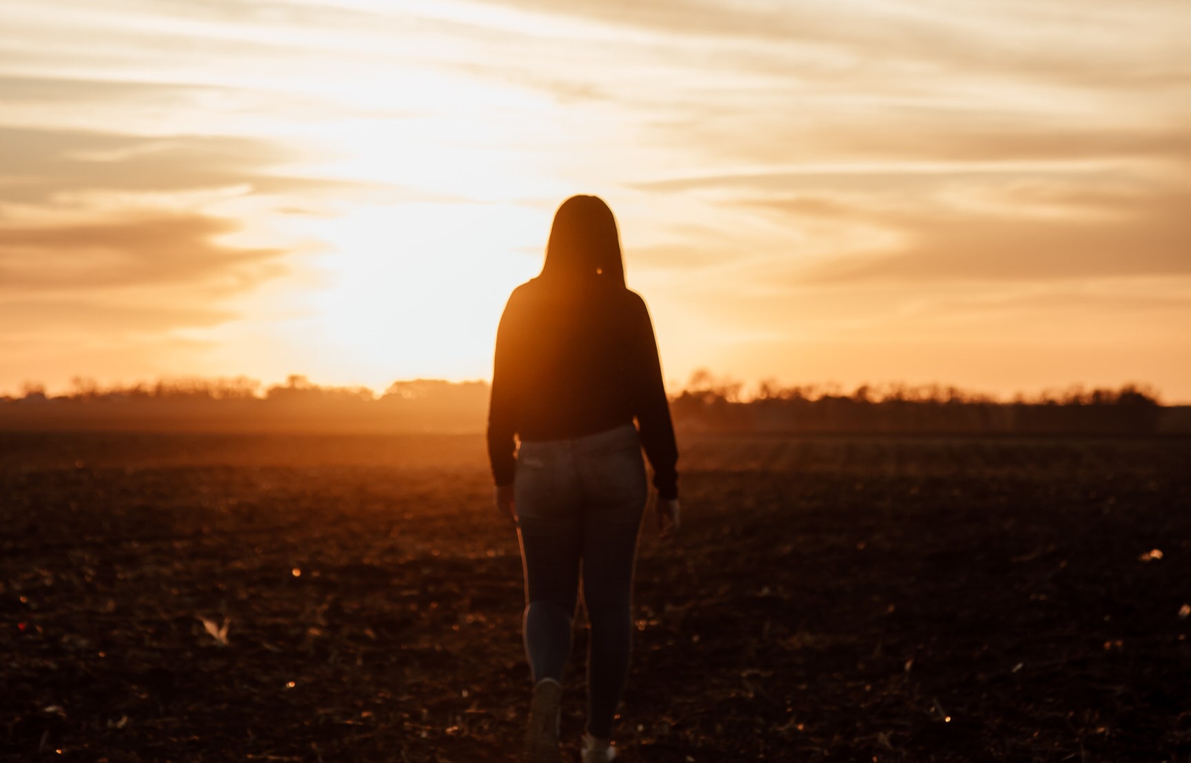 Woman walking in a field