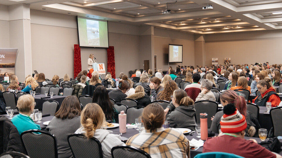 Audience listening to a speaker at the 2025 Nebraska Women in Agriculture Conference