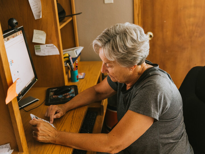 Female farmer working on a computer